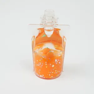 Figurină Decorativă Transparentă – Design cu Portocale Plutitoare și Efect cu Steluțe