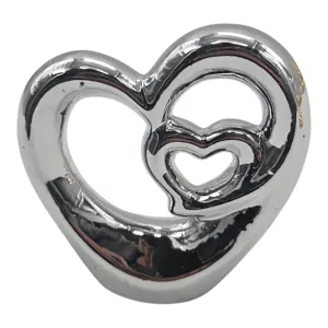 Obiect Decorativ din Ceramică, Model Inimi Împletite, 11 x 3,3 x 11,5 cm, Argintiu, Finisaj Metalizat Lucios, Ornament Elegant pentru Living, Dormitor și Birou